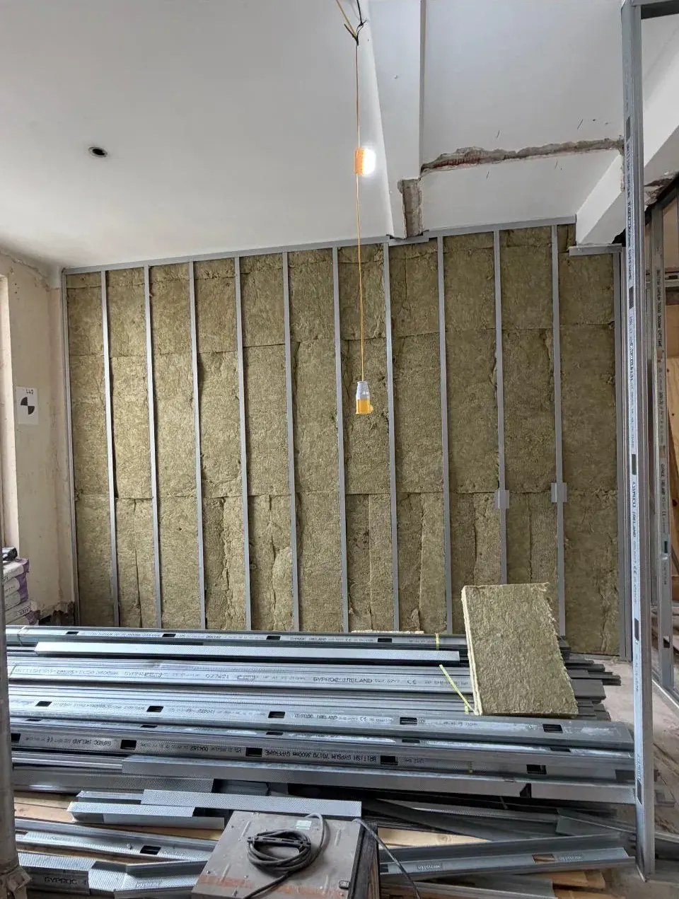 Acoustic wool between studs